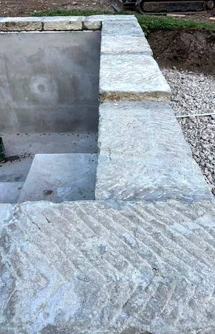 Pool with reclaimed stone edging – Studio Azzena project